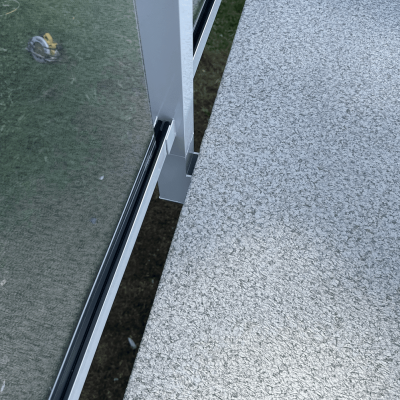 Side-mount-glass-railing-vinyl-drip-edge.png