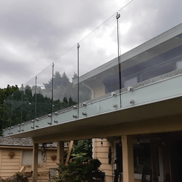 Vinyl-deck-12mm-glass-railing-with-standoffs.png